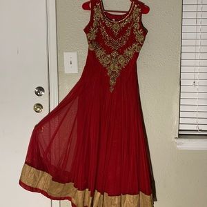 Beaded red w/gold trim dress. Zip up